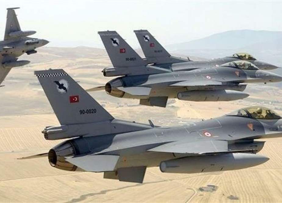 This file picture shows Turkish F-16 fighter jets flying in formation.