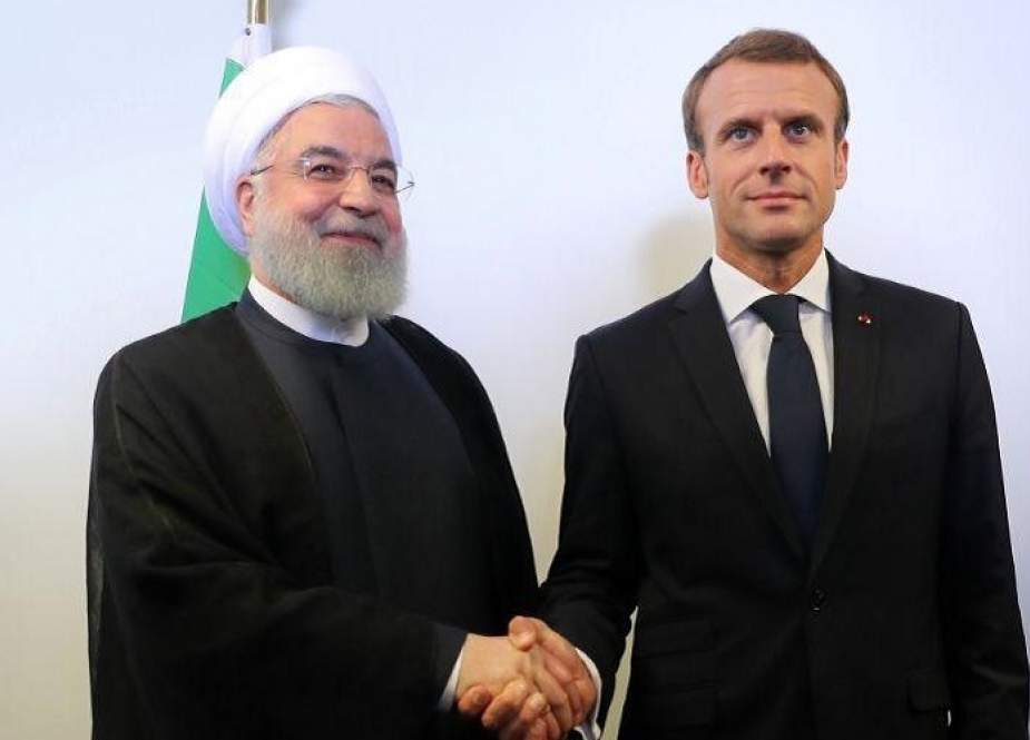 In this file photo taken on September 25, 2018 Iranian President Hassan Rouhani (L) meets with French President Emmanuel Macron on the sidelines of the UN General Assembly at the UN headquarters in New York. (AFP photo)