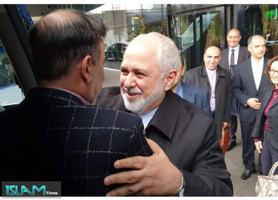 Iranian Foreign Minister Mohammad Javad Zarif Hugs cell scientist Masoud Soleimani who was freed after a year of imprisonment in the US.