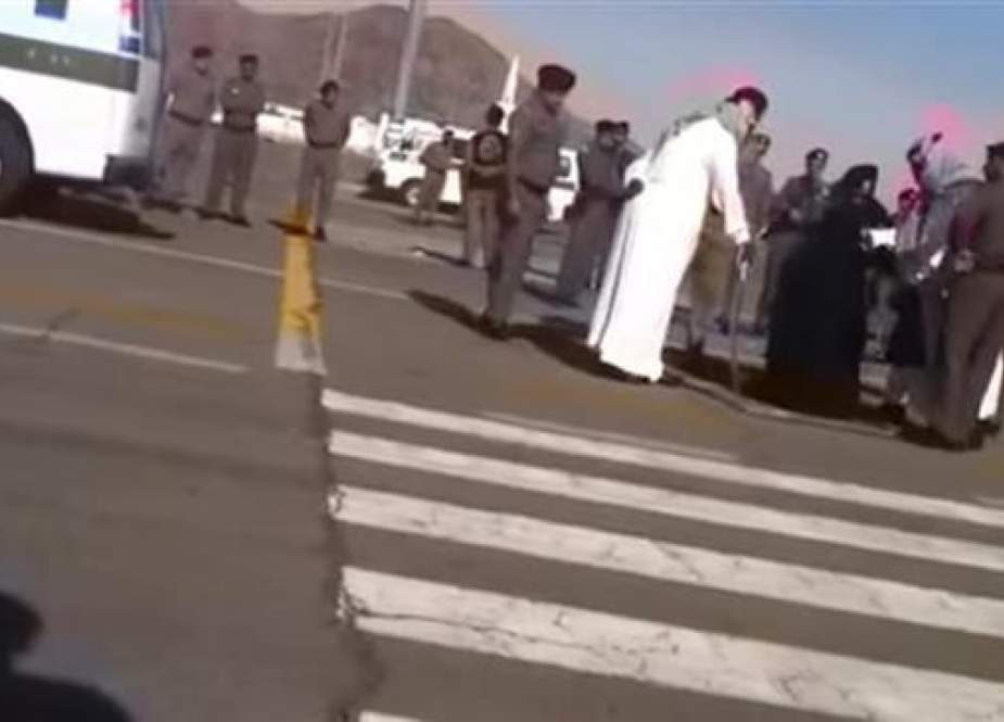 Woman is seen kneeling on the ground ahead of her execution in Saudi Arabia.jpg
