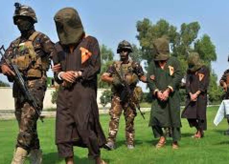 Afghan security force escort detained Taliban members.jpg