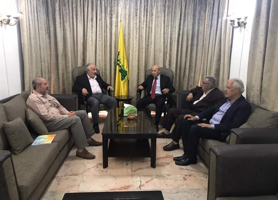 Head of Hezbollah Palestinian File Hasan Hoballah and the Hamas movement’s representative in Lebanon Ahmad Abdul Hadi and delegation