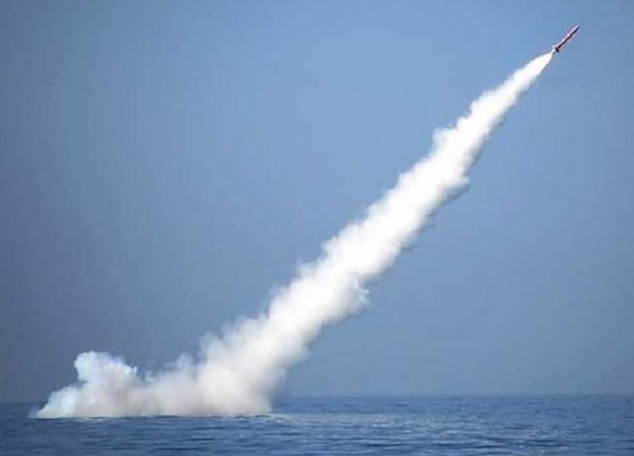 Iran’s Navy launches submarine missile during war game.jpg