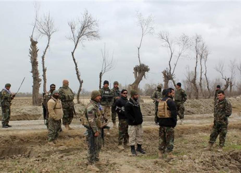 Afghan security forces are seen near an Afghan National Army (ANA) outpost in Kunduz Province.jpg
