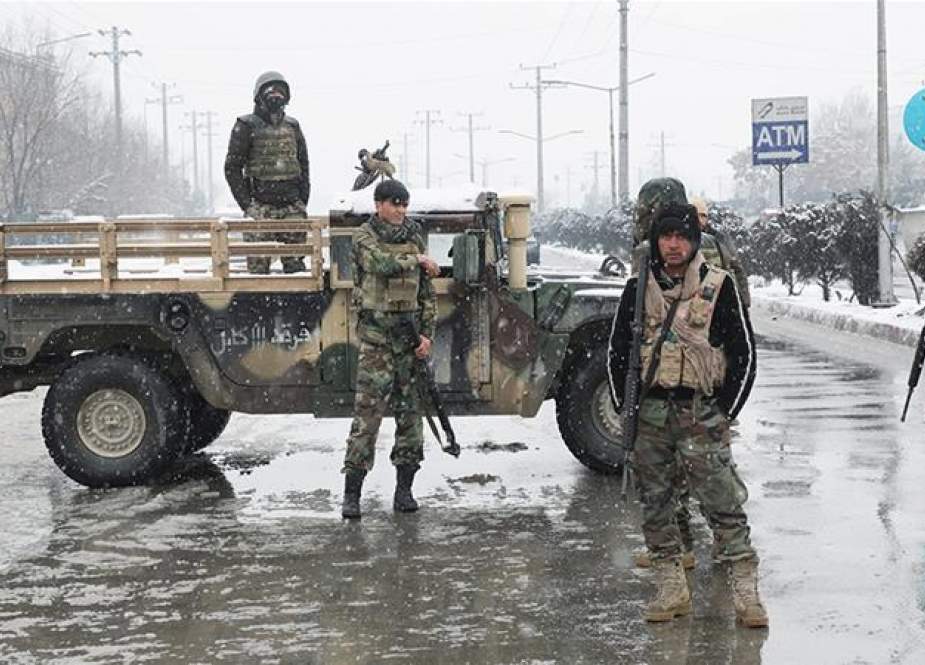 Afghan security forces near the site of a suicide attack in Kabul, Afghanistan.jpg