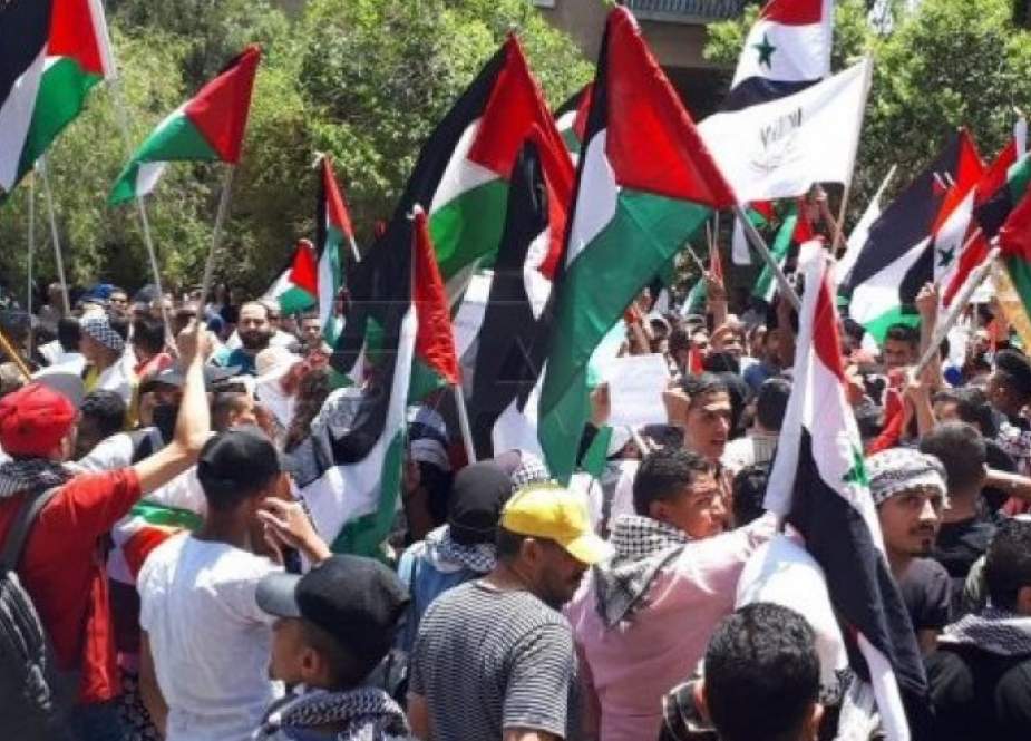 سورية..وقفة تضامنية مع الشعب الفلسطيني أمام مقر الأمم المتحدة بدمشق