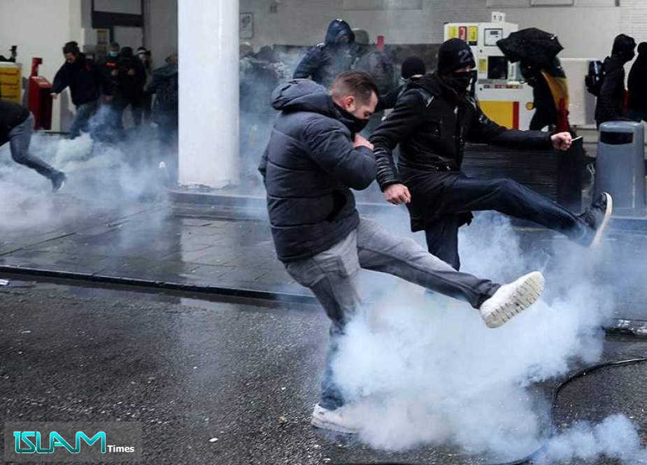 Protests against New COVID-19 Restrictions Turn Violent In Brussels