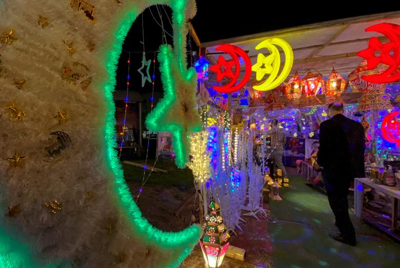 People shop for decorations for the holy month of Ramadan in Amman, Jordan, March 30, 2022. Picture taken March 30.