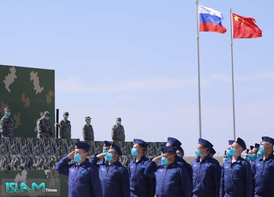 China, Russia Conduct Joint Military Exercise as Biden Visits Region