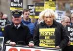 A protester dressed as British Prime Minister Boris Johnson outside Hillsborough Castle in Northern Ireland, May 2022.