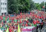 Protesters march during a national demonstration of trade unions in Brussels, Belgium, June 20, 2022