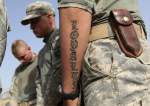 Recruiting crisis forces US Army to drop educational, tattoo rules