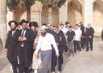 Israeli settlers intrude into the al-Aqsa Mosque compound in the occupied Old City of al-Quds on June 26, 2022 under the protection of the regime’s forces.