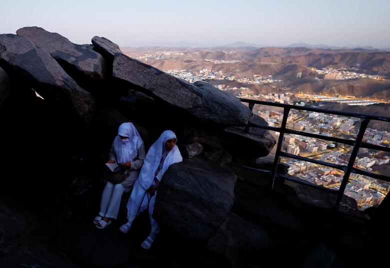 Muslim pilgrims visit Mount Al-Noor, where Muslims believe Prophet Mohammad received the first words of the Koran through Gabriel in the Hira cave, in the holy city of Mecca, Saudi Arabia, July 4, 2022.