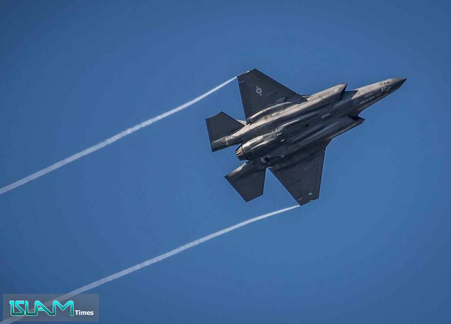 An F-35 Lightning II streaks across the sky while doing maneuvers to the Eglin Air Force Base runway.