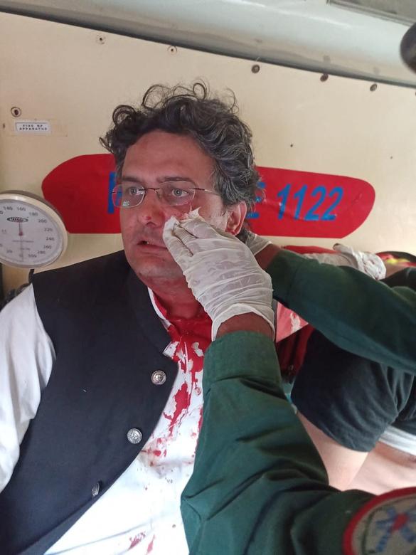 Politician Faisal Javed is treated by first responders after an attack in Wazirabad, Pakistan November 3, 2022.