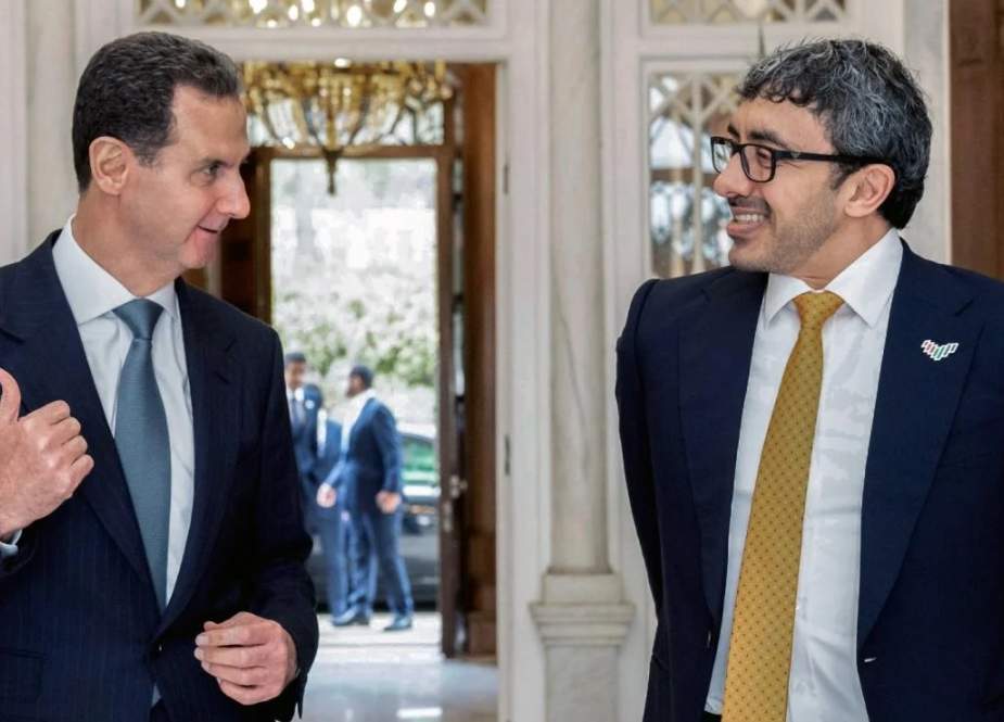 عبدالله بن زاید آل نهیان وزیر امور خارجه و همکاری بین‌المللی امارات متحده عربی در کنار بشار اسد