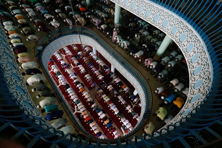 Muslims attend Friday prayer during Ramadan at Baitul Mukarram National Mosque in Dhaka, Bangladesh, March 24, 2023.
