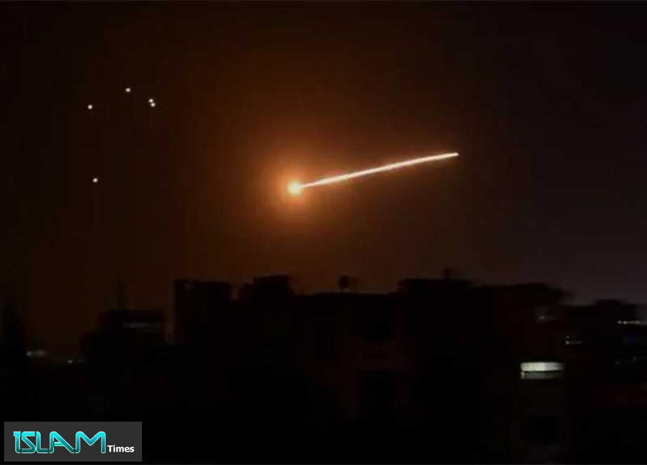 Syrian Air Defenses Confront ‘Israeli’ Missile Attack on Damascus, Two Soldiers Wounded