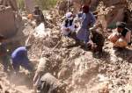 Afghan residents clear debris for victims