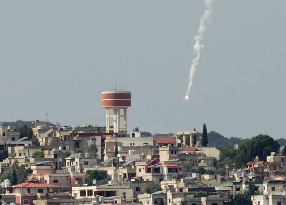 Israeli military flare is seen over Aita al-Shaab, a Lebanese border village with Israel in south Lebanon
