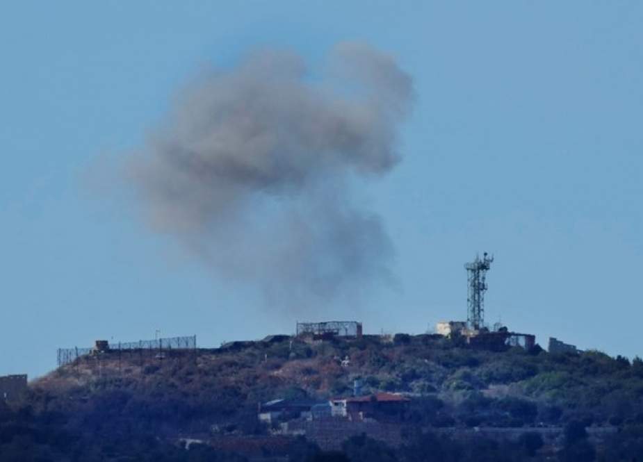 Smoke rises from an Israeli army position which was hit by Hezbollah shells