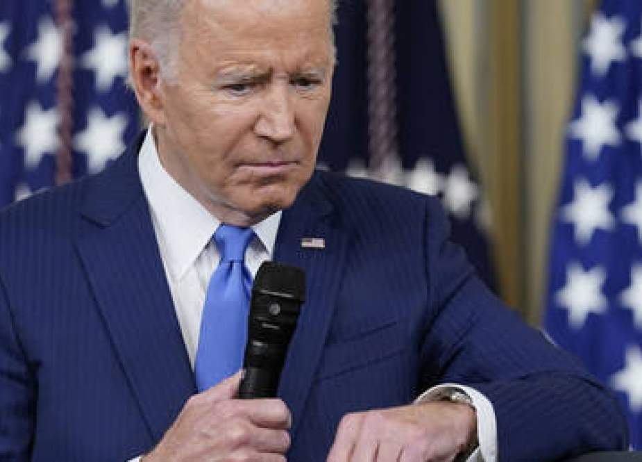 Joe Biden listens to a question from a reporter as he speaks at the White House in Washington, DC
