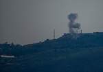 Smoke rises in northern occupied Palestine following a rocket strike from southern Lebanon